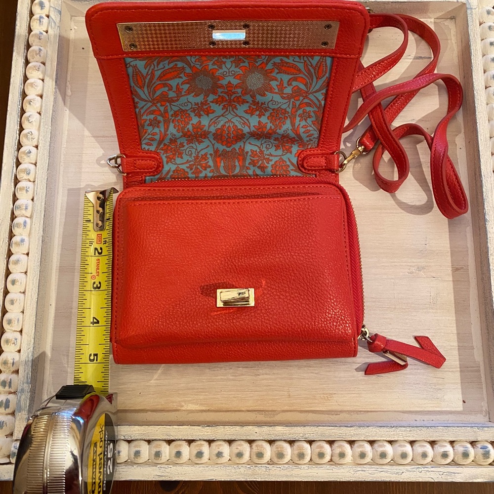 Big Buddha Orange crossbody. 2 issues!Clasp/closure loose/Worn place on back